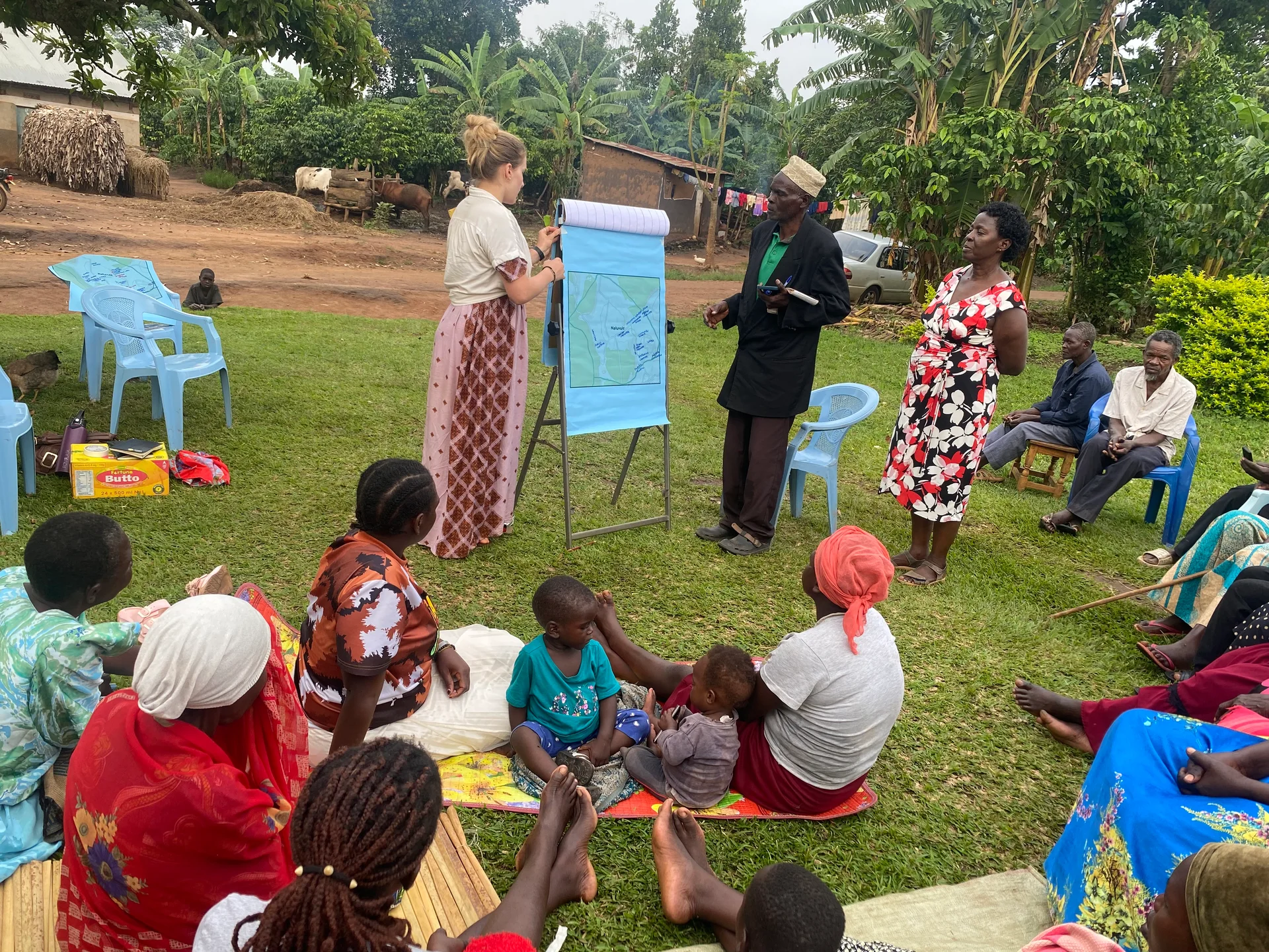 A participant facilitating an outdoor community learning activity
